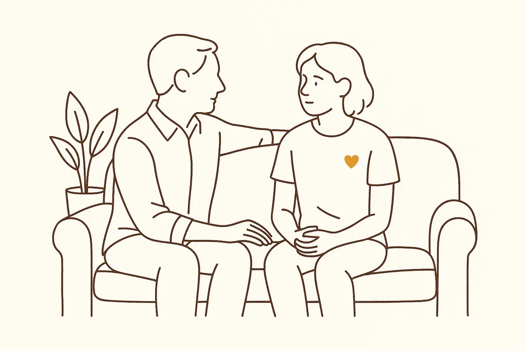 A supportive parent and teen talking on a couch