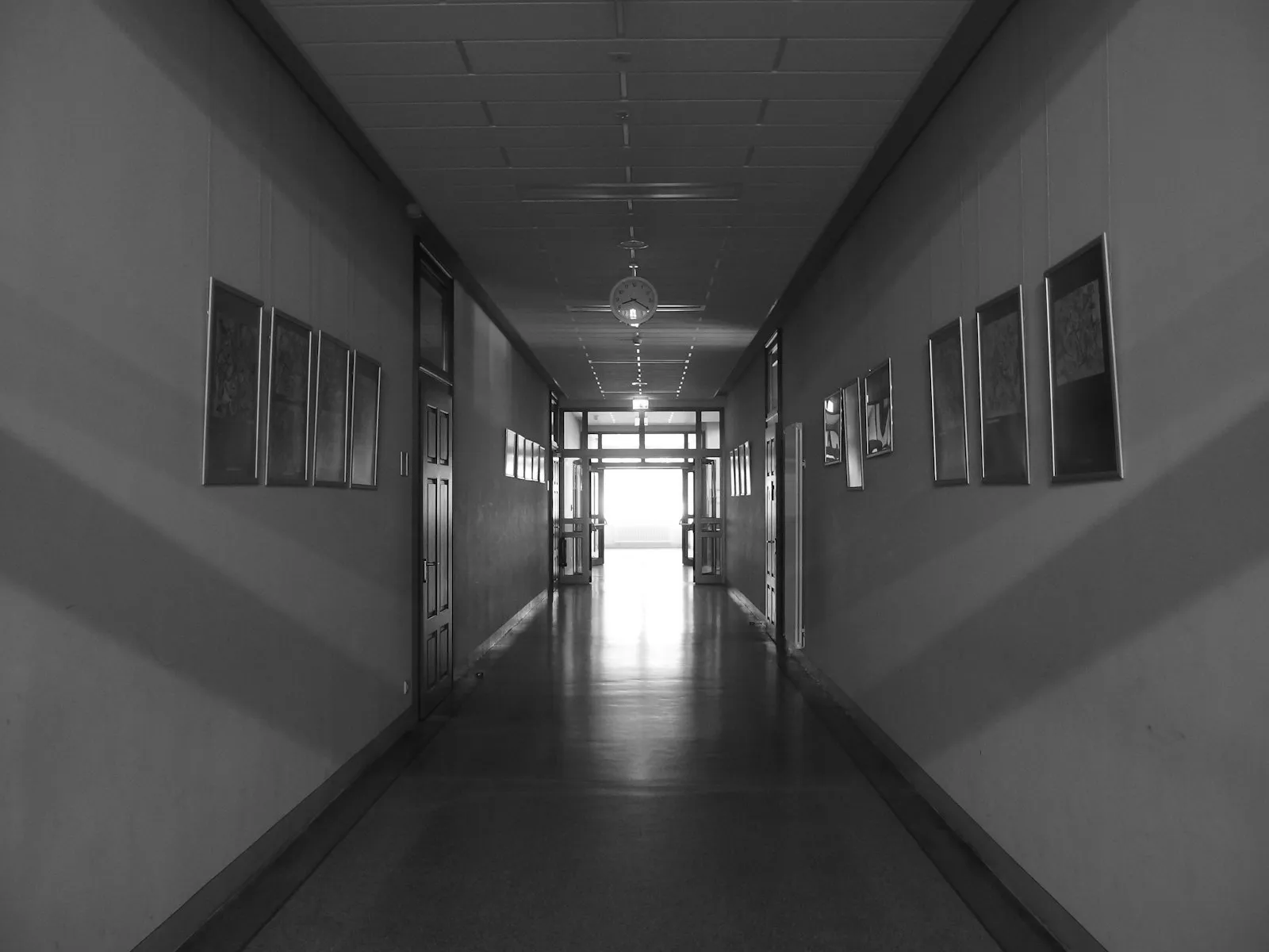An empty school hallway with lockers